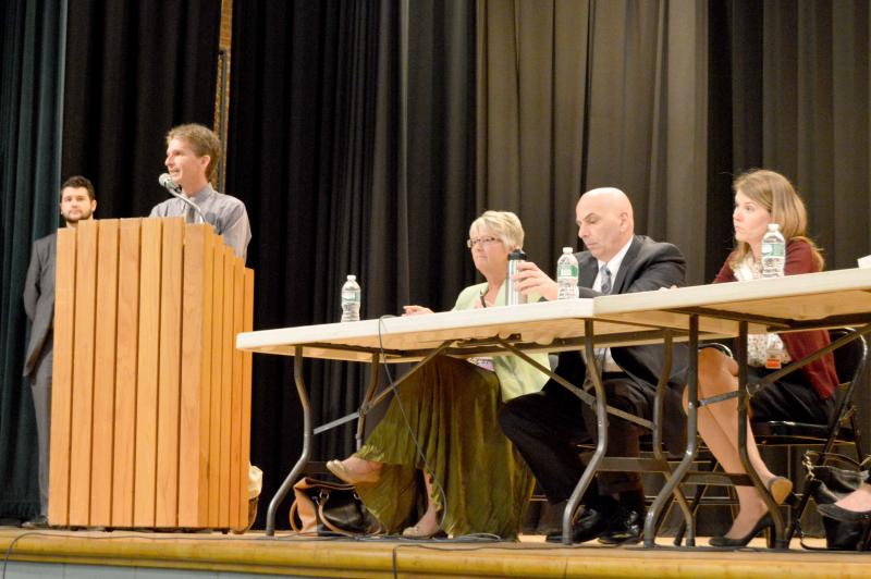 Director of Public Health Christopher Michaud speaks during the first panel discussion of COPE, a newly formed group aimed at tackling the growing opioid crisis. BY SETH THOMAS