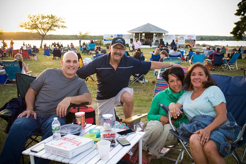 Barrin Soares, Jeff Antil, Nicky Soares, and Nancy Antil brought a full spread of food to the concert. BY DOLLY GENANNT