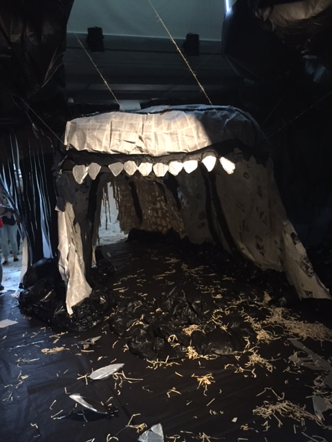 Guests must walk through the mouth of "Oh, Whale!" Students used trash bags, books, and file folders for this installation. BY ANGIE HILSMAN