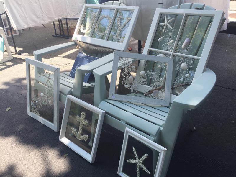 Carvalho and Moniz work to handcraft these decorated windowpanes. Carvalho said she's turned her son's bedroom into a craft room. BY ANGIE HILSMAN