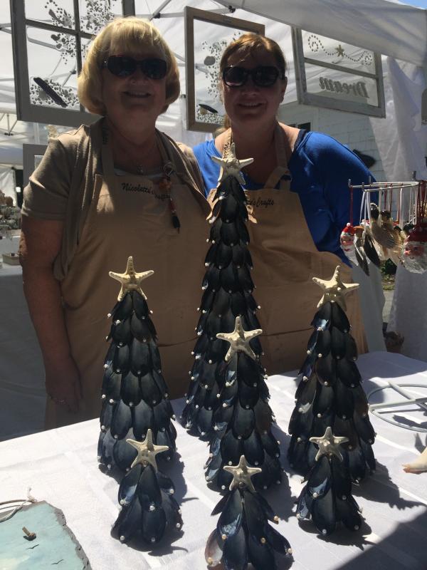 Colette Benoit and daughter Nicole Correia said they buy mussels in bulk to "feed the family and the neighborhood" their mussel marinara, then repurpose the shells to make Christmas decorations. BY ANGIE HILSMAN