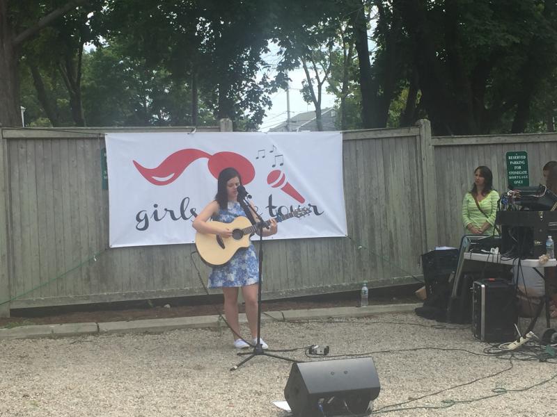 Fifteen-year-old Dartmouth resident Amy Manny not only hosted the performance, but also performed songs she'd written. BY ANGIE HILSMAN