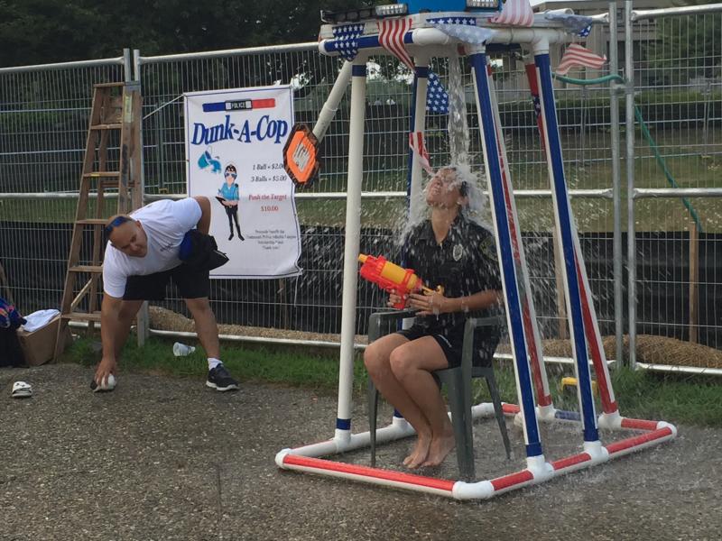 Dartmouth Patrolwoman Amanda Tavares was shivering by the time her Dunk-a-Cop shift was over. BY ANGIE HILSMAN
