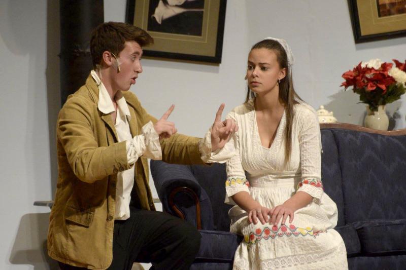 Austin Watts plays schoolteacher Leon Tolchinsky, and tries to educate Sophia Zubritsky, played by Abigail Richard. COURTESY DARTMOUTH HIGH THEATRE COMPANY/ FACEBOOK
