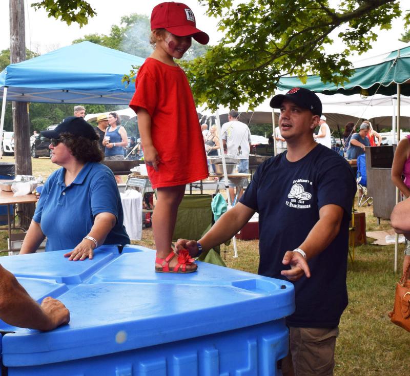Three-year-old Isabella Ferreira was full of smiles and laughter at the last ever Dartmouth Blowout fundraiser on August 13. The annual summer party, which featured food, drinks, and plenty of music, raised money for her family after the sudden passing of her father Ryan Ferreira, a firefighter in Dartmouth and Walpole. It was also the final Blowout Dartmouth will ever see, as event organizers decided it would be the last. BY DOUGLAS MCCULLOCH