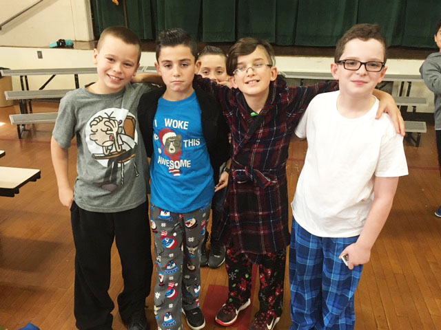 Fifth graders William Walecka, Jordan Baganha, Donald Mello, and Joshua Britton celebrate Pajama Day at Potter School. COURTESY RICK PORTER