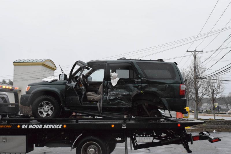 SUV crashes into three cars for sale on Cohasset lot