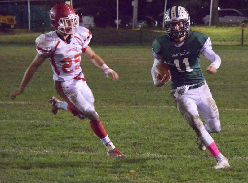 The Dartmouth High football team did not gain its third consecutive Super Bowl title,but had a 16-game winning streak. Here, starting quarterback Cole Jacobsen outruns a Barnstable player during the team’s October 22 Old Colony League-winning game –Dartmouth’s first since 2008. Jacobsen ended his two-year career as the Indians starting quarterback and will be heading to Southern New Hampshire University next fall to play lacrosse and study business. BY DOUGLAS MCCULLOCH