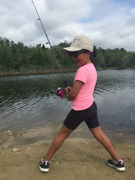 A'mya Acevedo, 5, was one of 60 kids who enjoyed the Dartmouth Knights of Columbus's annual "Get Hooked on Fishing, Not on Drugs" fishing derby on August 6 at Mello's Pond. The 27-year tradition attracts some of Dartmouth's youngest fishing fans between the ages of 6-16. BY ANGIE HILSMAN