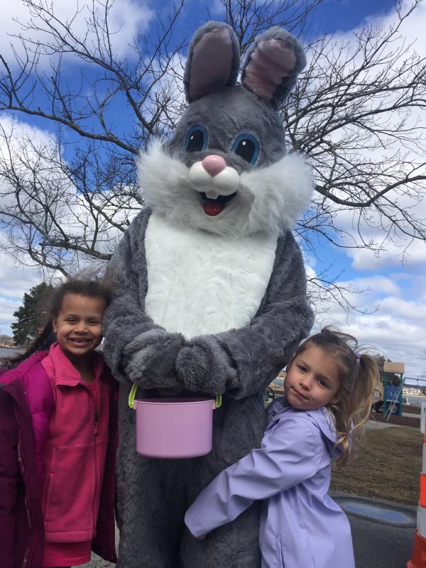 Ayva Yarde and Ella Cronin, both 5, strategized their route before running for eggs. BY ANGIE HILSMAN