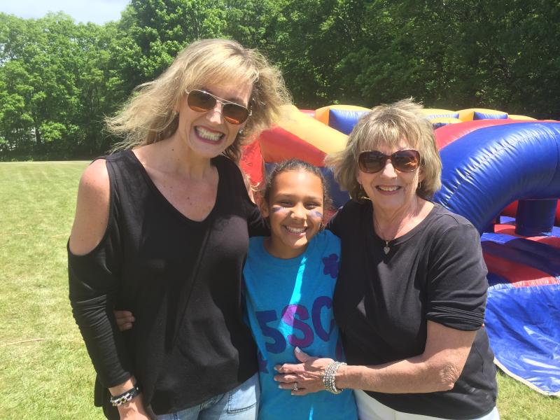 Fifth grader Haley Jenkins smiles with her mom Brooke Jenkins and her grandmother Pamela Ahlander. BY ANGIE HILSMAN