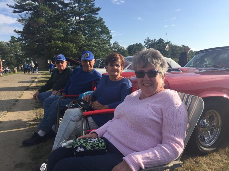 Roy Tripp, Billy Santos, Pat Santos, and Andrea Tripp attend the event yearly to show off their classic cars. BY ANGIE HILSMAN
