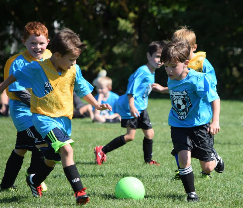 Dartmouth Week - Dartmouth, MA news - Children playing at the Dartmouth Youth Soccer Association’s fall opener last year. Photo by: Douglas McCulloch