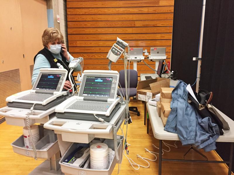 Dartmouth Week - Dartmouth, MA news - Janet Macedo of Southcoast Health checks on the EKG machines. Photos by: Kate Robinson