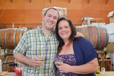 Jesse Reid (left) and Jennifer Manchester (right) of Tiverton gave the vineyard rave reviews. The two planned to hold their wedding at the vineyard, but Running Brook's schedule filled up faster than they expected. BY SETH THOMAS