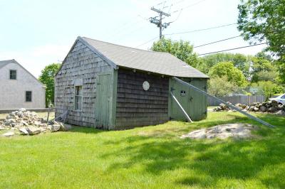 A shed, built sometime in the 1930s, will be demolished to make way for street access and parking. BY SETH THOMAS