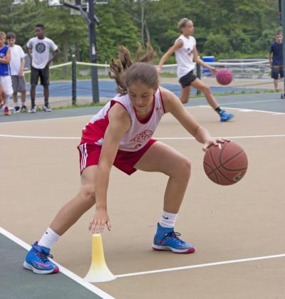 Both boys and girls took part in the Avery Bradley clinic at the Burgo Basketball Association. BY NICK WALECKA