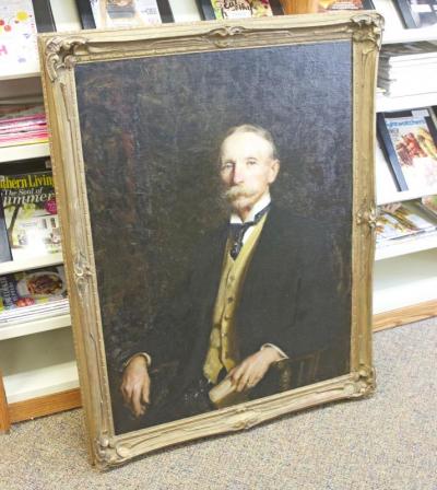 A portrait of Mr. L. S. Ipsen was one of the paintings that recently returned to the library. BY NICK WALECKA
