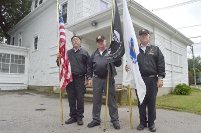 Members of Vietnam Veterans of America Chapter 499 were present at the ceremony. From left: Rick Janson, Albert Audette and John Remedis. BY SETH THOMAS