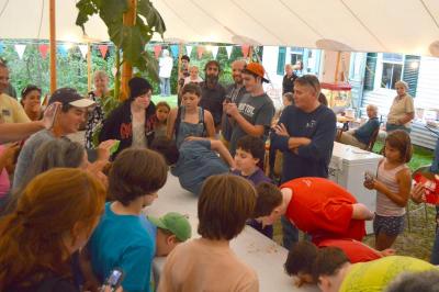 A pie eating contest was the center of outdoor festivities on the first night of the fair. BY SETH THOMAS