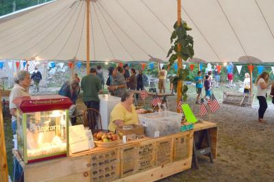 A country store, featuring local goods and homemade cookies, was set up outside the doors of the Grange. BY SETH THOMAS