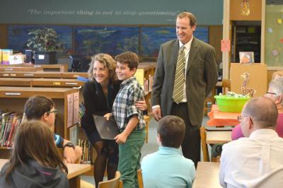 First Lady of Massachusetts hands out citations to the top 14 students at Quinn. Each of the students logged more than 4,000 minutes during the summer vacation. BY SETH THOMAS