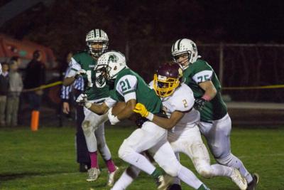 Running back Marquise Adams refused to be taken down as he went in for another touchdown for Dartmouth. BY LAUREN ZAKNOUN