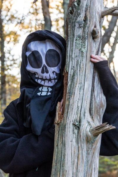 Andrew Banno, 13, hid away to surprise the hikers just before they arrived at the story pit. BY LAUREN ZAKNOUN