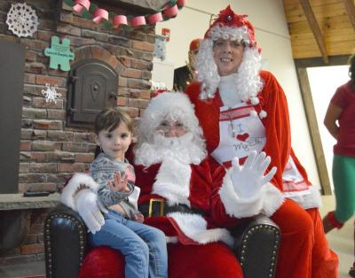 Mr. and Mrs. Claus dropped by the Dartmouth YMCA during the Y's first-ever Holiday Craft Fair. BY SETH THOMAS