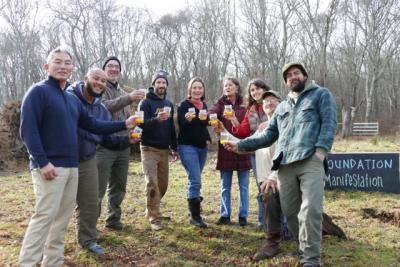 The Round the Bend family drinks fire cider made from ingredients around the farm during the ground awakening ceremony. COURTESY DESA VANLAARHOVEN