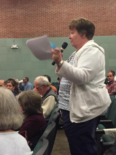 Cyndi Mikkelson asks whether the proposed locker allotments allow for affirmative action. BY ANGIE HILSMAN