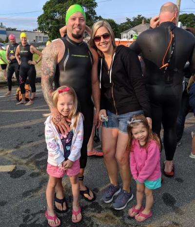 Alberto Dias with his wife Molly and his daughters Amelia (left), 5, and Emerson, 2, at the swim