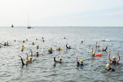 Participants wave at the 2019 Buzzards Bay Swim