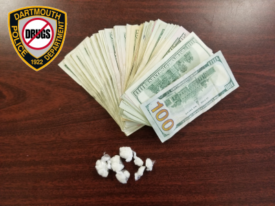 Police seized nine grams of suspected crack cocaine and over $1,000 in cash at the time of the arrest