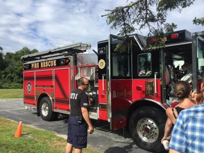Dartmouth Fire District No. 1 made an appearance with a shiny red fire truck for the kids to explore.