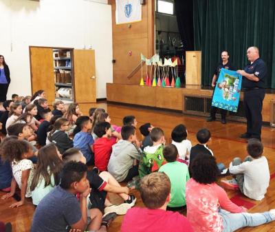 Poente shows off his Toy Story pillowcase, explaining that if trapped inside a room, waving a pillowcase by a window will help firefighters come to the rescue.