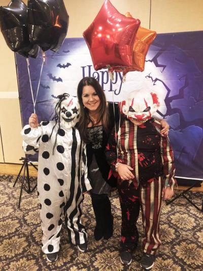 DYSA Board member Paula Medeiros with two terrifying clowns at the party. Photo courtesy: DYSA