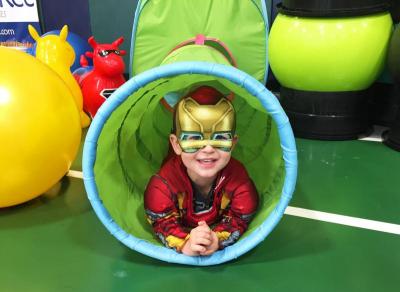 Iron Man, a.k.a. Oliver Pierpont, 3, plays during the event.