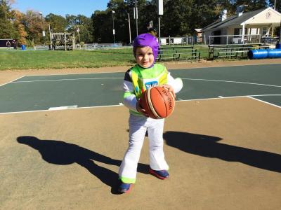 Buzz Lightyear (a.k.a. four-year-old Nicholas Matias) plays ball.