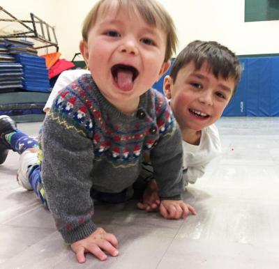 Dartmouth, MA news - Five-year-old Desmond Gregory attempts to hold on to his brother Lincoln.