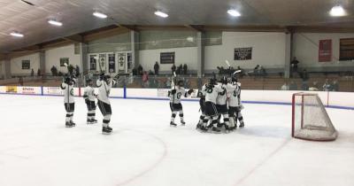 Dartmouth, MA news - sports - The team celebrating their win on the ice