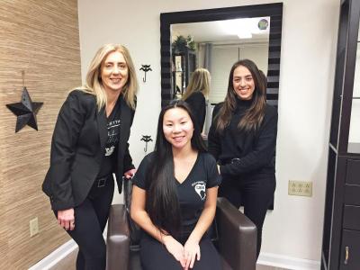 Salon En Vogue owner Lisa Leite (left) with Julianna Dick and salon coordinator Shelley Mendes. Photo by: Kate Robinson