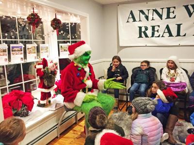 Dartmouth, MA news - The Grinch tells stories at Anne Whiting real estate.