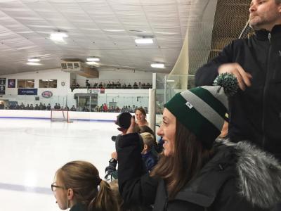 Dartmouth, MA news - sports - Dartmouth resident Jessica Simmons throws a puck onto the ice for the chuck-a-puck competition