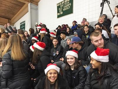 Dartmouth, MA news - sports - Bishop Stang supporters wore black with Santa hats for the holiday tournament