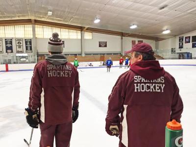 Dartmouth, MA news - sports - Assistant Coach Brandon Medeiros and Coach Theodore watch the girls drill