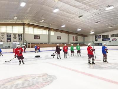 Dartmouth, MA news - sports - hockey - The team lines up for another drill at the Hetland Arena in New Bedford