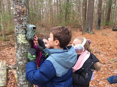 Dartmouth, MA news - Students — led by eight-year-old Erik Kowalski— check out the camera