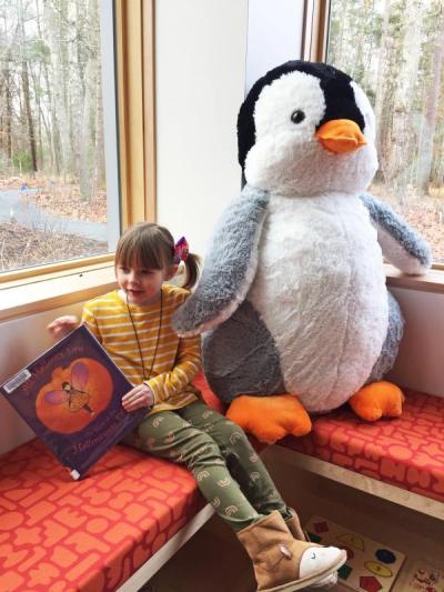 Four-year-old Dartmouth resident Emmelia Boucher was among the first to visit the new library