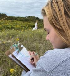 Dartmouth, MA news - Student volunteer Hannah Oliver. Photo courtesy: Lloyd Center for the Environment